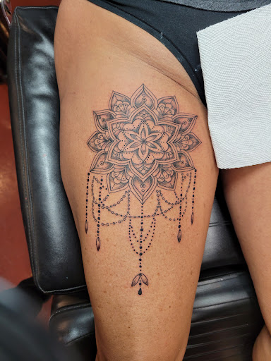 Find animal neck tattoo ideas for your next unique tattoo in Dripping Springs at Hill Country Arts Piercings And Tattoos