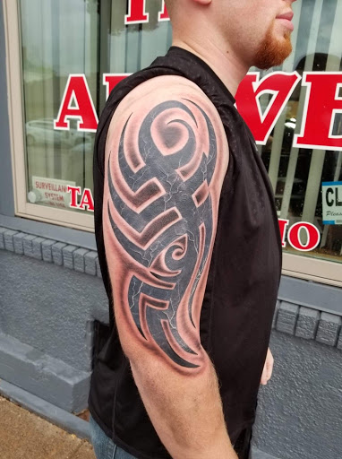 Explore thigh tattoo ideas, creative tattoo ideas in Marshfield, available at All The Above Tattoo Studio