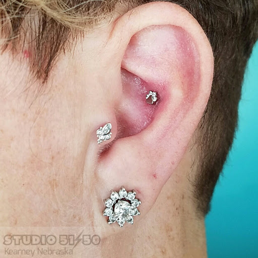 Find cowboy tattoos ideas for your next unique tattoo in Kearney at Studio 5150 Piercing & Fine Jewelry