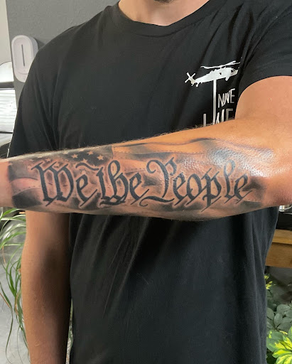 Explore afro tattoo ideas, creative tattoo ideas in Toledo, available at Ellis Ink