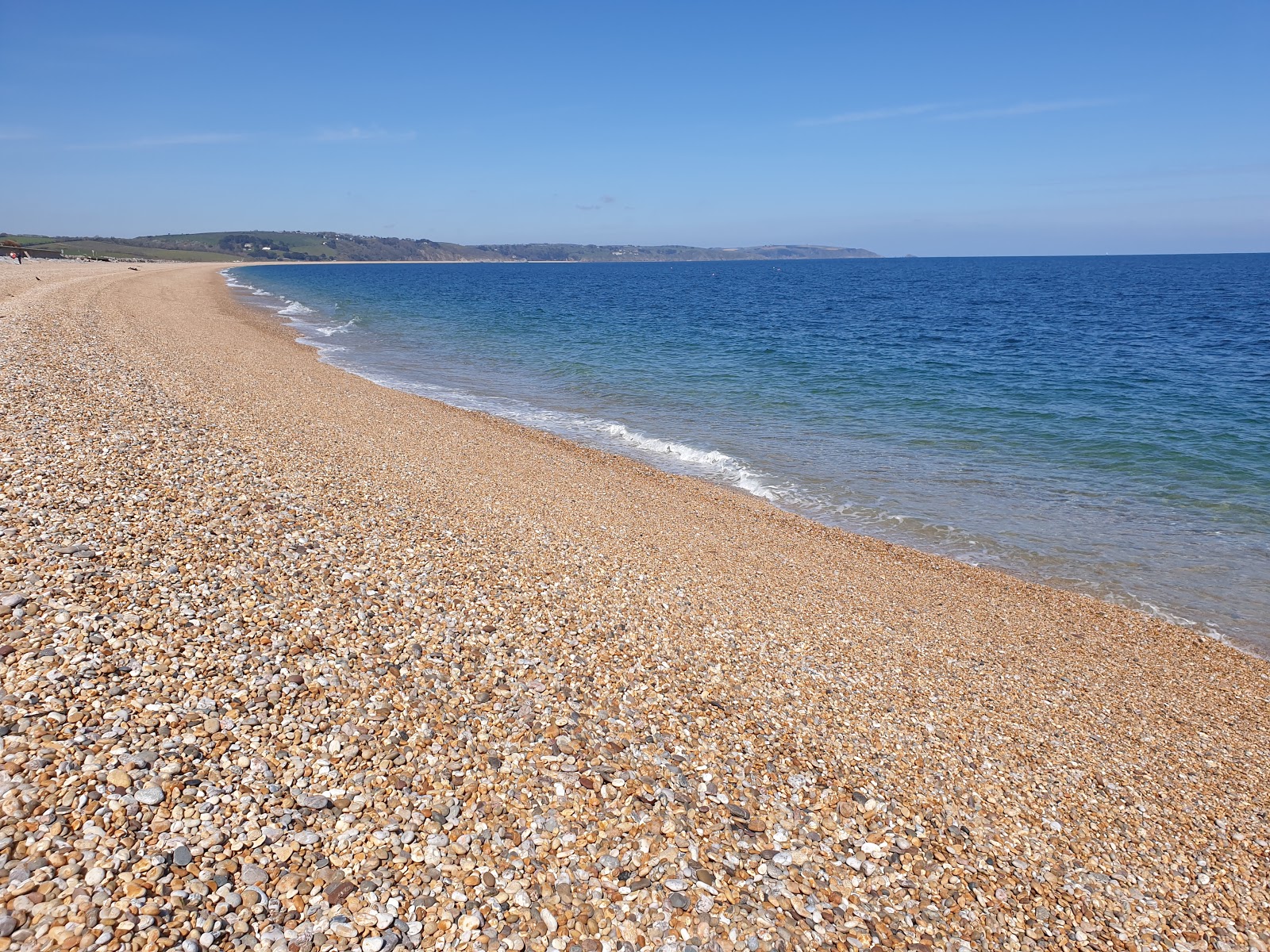Foto von Slapton Strand mit feiner heller kies Oberfläche