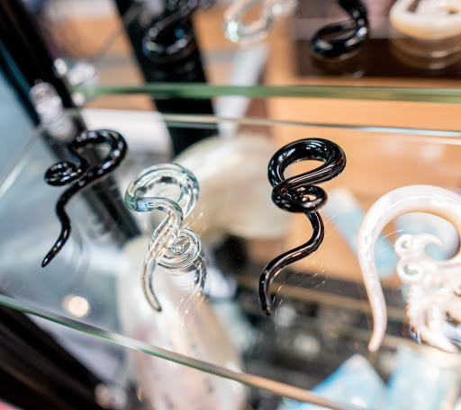 Explore tree tattoo ideas for guys, creative tattoo ideas in Summerville, available at Exotic Impressions Body Piercing