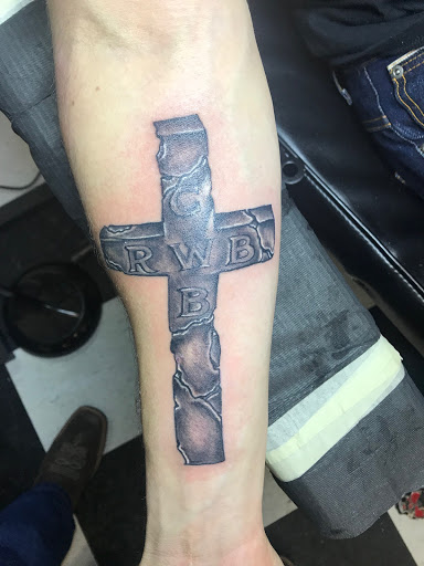 Explore back of shoulder tattoo ideas, creative tattoo ideas in Evans Mills, available at Undeniable Ink