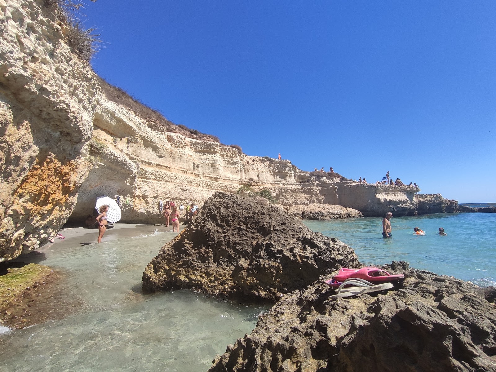 Photo de Spiaggia della Punticeddha avec petite baie