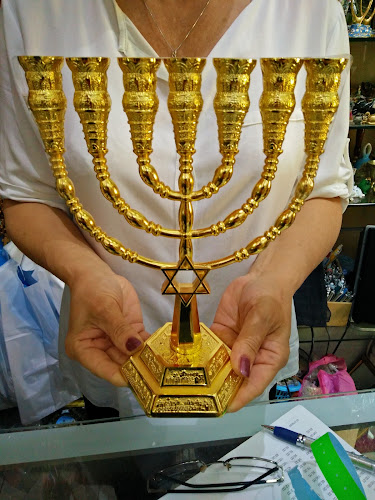 Holylan Legacy - Nekudat Chen ייצור ושיווק מתנות מיוחדות מישראל לכל הדתות קטורת אבנים וקריסטלים מזכרות מישראל נקודת חן חיפה - חנות