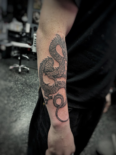 Explore great half sleeve tattoo ideas, creative tattoo ideas in Fort Myers, available at Loyal 2 The Coil Tattoos & Piercings (Edison Mall Location Entrance F)