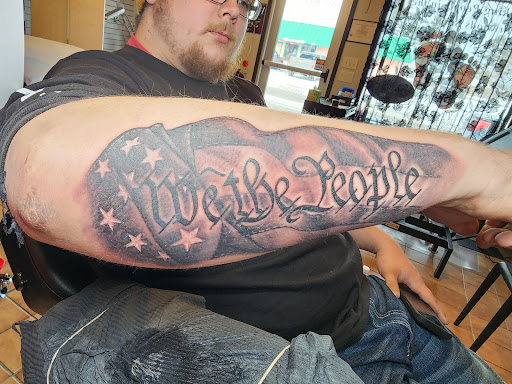 Explore cancer ribbon tattoo ideas, creative tattoo ideas in Minocqua, available at Walking Arts Tattoos