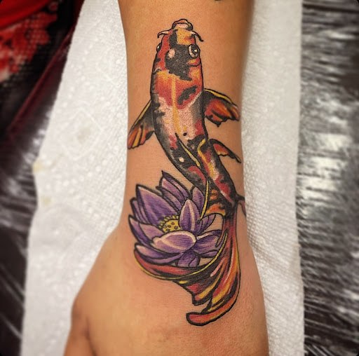 Explore name on neck tattoo ideas, creative tattoo ideas in Fort Myers, available at Loyal 2 The Coil Tattoos & Piercings (Edison Mall Location Entrance F)