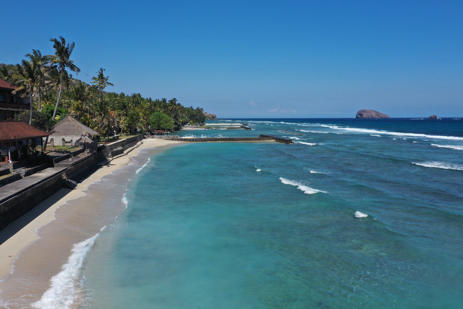 Photo of Candidasa Beach with turquoise pure water surface