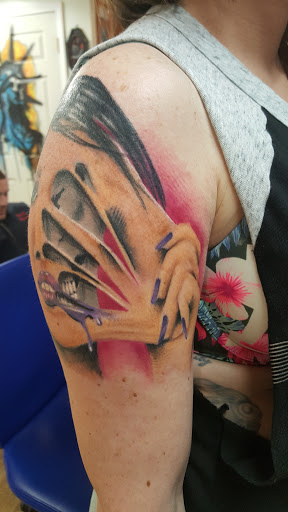 Explore anunnaki tattoo ideas, creative tattoo ideas in Marion, available at Eternal Art Tattooing