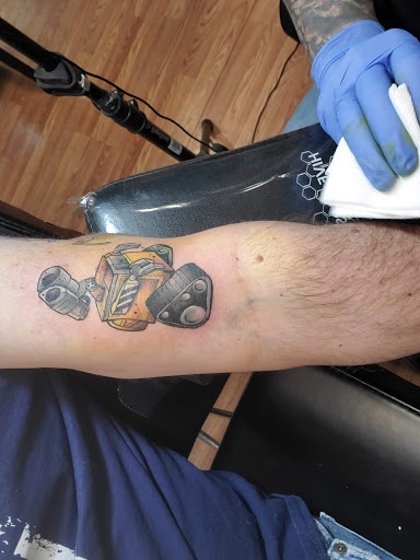Explore arrow tattoo ideas, creative tattoo ideas in Council Bluffs, available at Lil Bros Tattoo