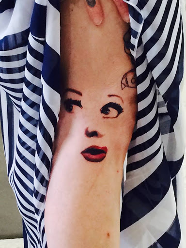 Find surrealism tattoo ideas for your next unique tattoo in Emporia at Mauds Tattoo Company