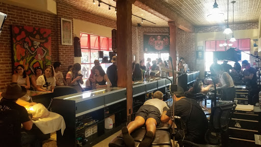 Explore forearm rose tattoo ideas, creative tattoo ideas in Venice, available at Ink Monkey Tattoo and Piercing