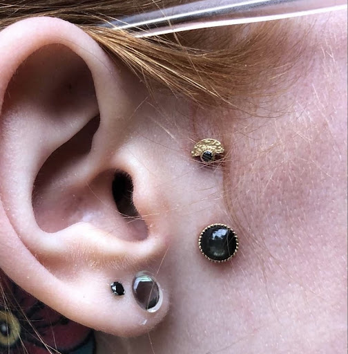 Explore 4 element tattoo ideas, creative tattoo ideas in Marietta, available at The Queen Bee Tattoo and Piercing Parlour