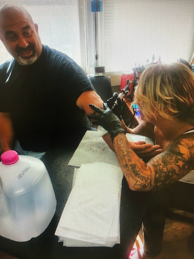 Explore portugal tattoo ideas, creative tattoo ideas in Kingston, available at Innovative Ink Tattoo & SMP