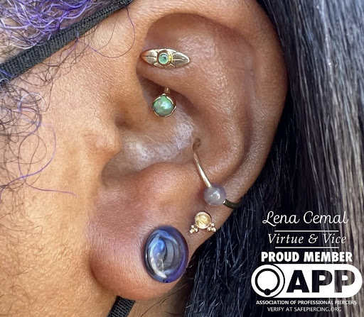 Find tattoo under breast ideas for your next unique tattoo in Atlanta at Virtue and Vice Body Piercing