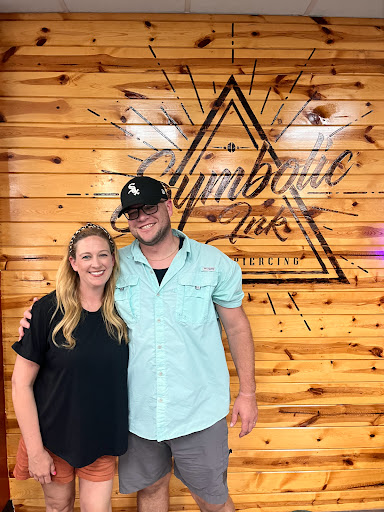 Explore matching tattoo ideas for brothers, creative tattoo ideas in Foley, available at Symbolic Ink Tattoo Studio