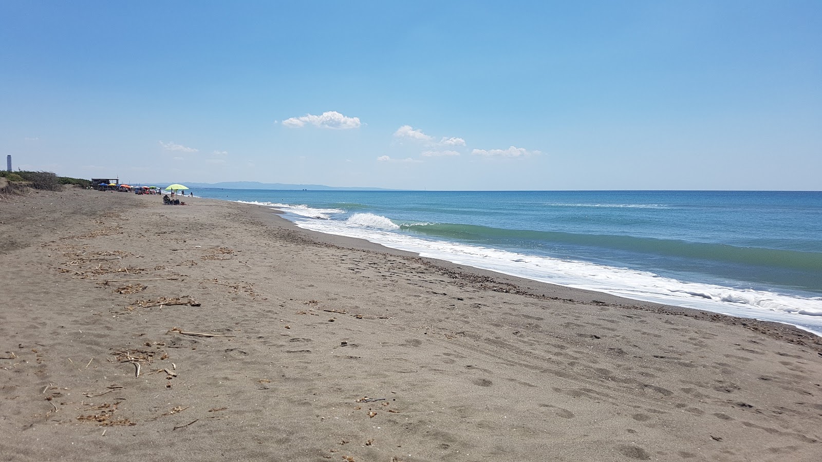Valokuva Spiaggia di Pescia Romanaista. mukavuudet alueella