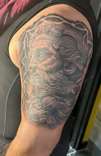 Explore vacation tattoo ideas, creative tattoo ideas in Greenwood, available at Vault 74 Tattoo, LLC