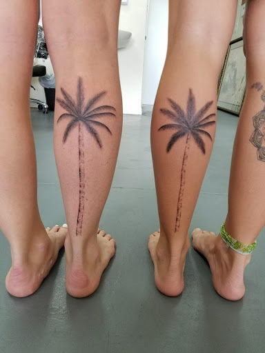 Explore universe tattoo ideas, creative tattoo ideas in Fort Myers, available at Tiger Lotus Tattoo and Piercing