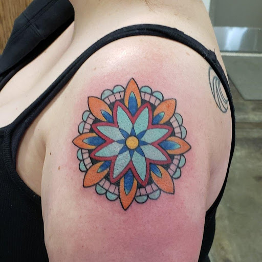 Explore thigh hip tattoo ideas, creative tattoo ideas in Sioux Falls, available at Heart Tattoo