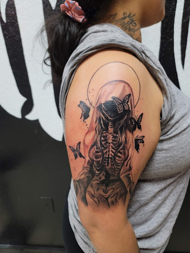 Explore december birthday tattoo ideas, creative tattoo ideas in Hereford, available at Slow Pain Tattoo Body Art Studio