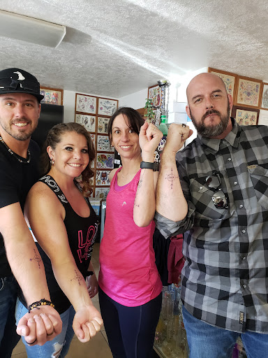 Explore embroidery tattoo ideas, creative tattoo ideas in Elko, available at Tom Custom Tattoos and Body Piercing Studio