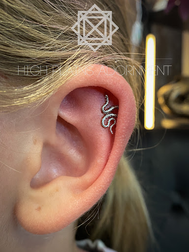 Explore polka trash tattoo ideas, creative tattoo ideas in Casper, available at High Plains Adornment