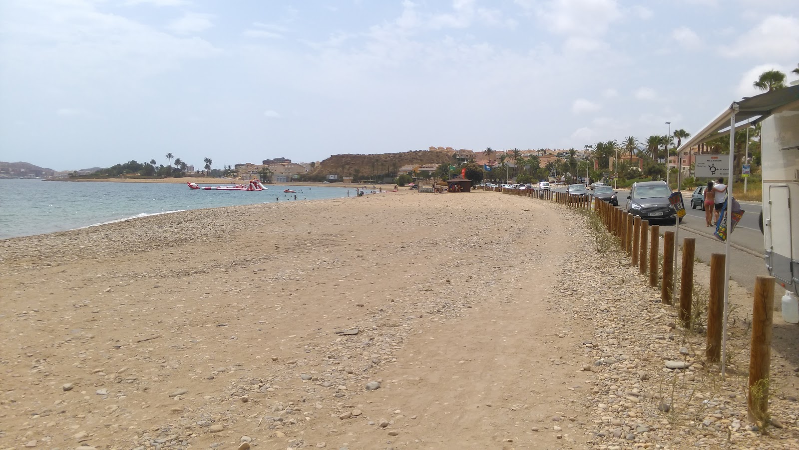 Photo of Playa del Alamillo with brown sand &  rocks surface