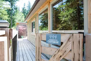 Secret Cove Treehouse Cottage and Suites image