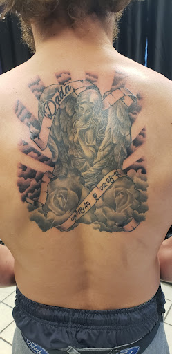 Explore batman logo tattoo ideas, creative tattoo ideas in Ocala, available at Black Lotus Tattoo & Art Gallery Inc