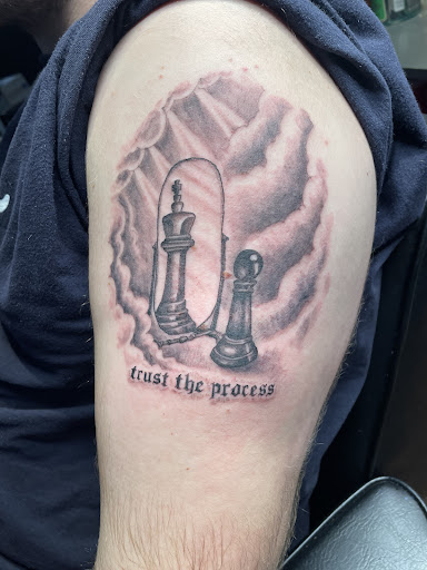 Explore tiny ankle tattoo ideas, creative tattoo ideas in Scarsdale, available at Damm Nice Tattoo & Body Art