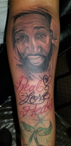 Find necklace tattoo ideas for your next unique tattoo in Angola at Hoodlum Ink