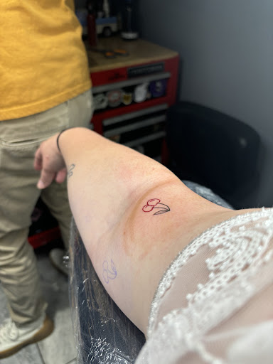 Explore rib tattoo ideas for women, creative tattoo ideas in Anniston, available at Classic 13 Tattoo