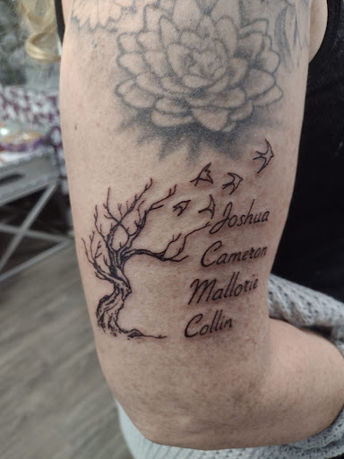 Explore philosophical tattoo ideas, creative tattoo ideas in Cadillac, available at Warchief Tattoo, LLC