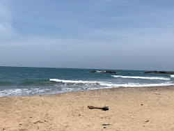Foto von Komari Beach mit lange, gerade küste