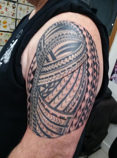 Explore hand tattoo ideas, creative tattoo ideas in Pelham, available at Tattoo Fever