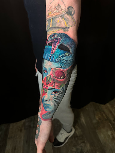 Explore one piece tattoo ideas, creative tattoo ideas in Mount Morris, available at Dagger Face Tattoos