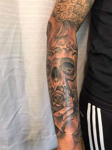 Explore fishing tattoo ideas for guys, creative tattoo ideas in Easton, available at Famous Tattoo Works