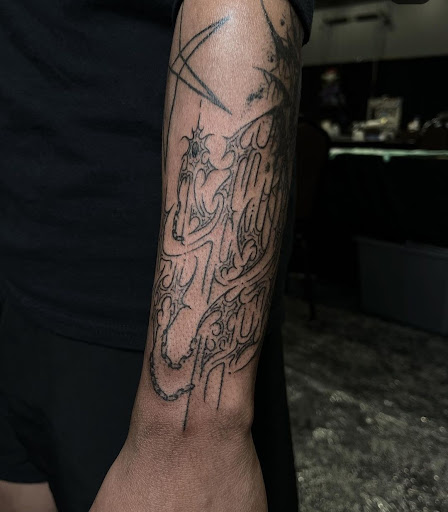 Explore weightlifting tattoo ideas, creative tattoo ideas in South Saint Paul, available at Kingdom Ink Studio