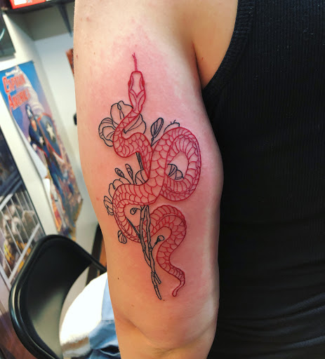 Explore deceased dog tattoo ideas, creative tattoo ideas in Alamosa, available at The Shop Tattoo & Comics