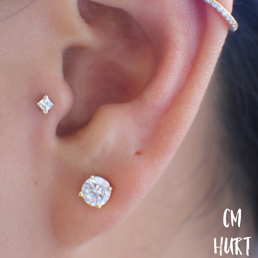 Explore female throat tattoo ideas, creative tattoo ideas in Garden Grove, available at CM Hurt Piercing & Jewelry