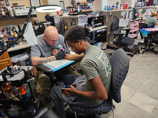 Explore christian forearm tattoo ideas, creative tattoo ideas in Portsmouth, available at GREGS TATTOOS LLC