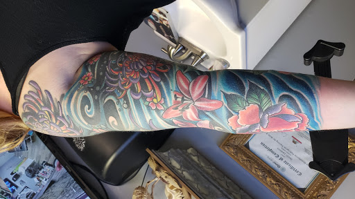 Explore women's quarter sleeve tattoo ideas, creative tattoo ideas in Brentwood, available at Eleven Mag Tattoo