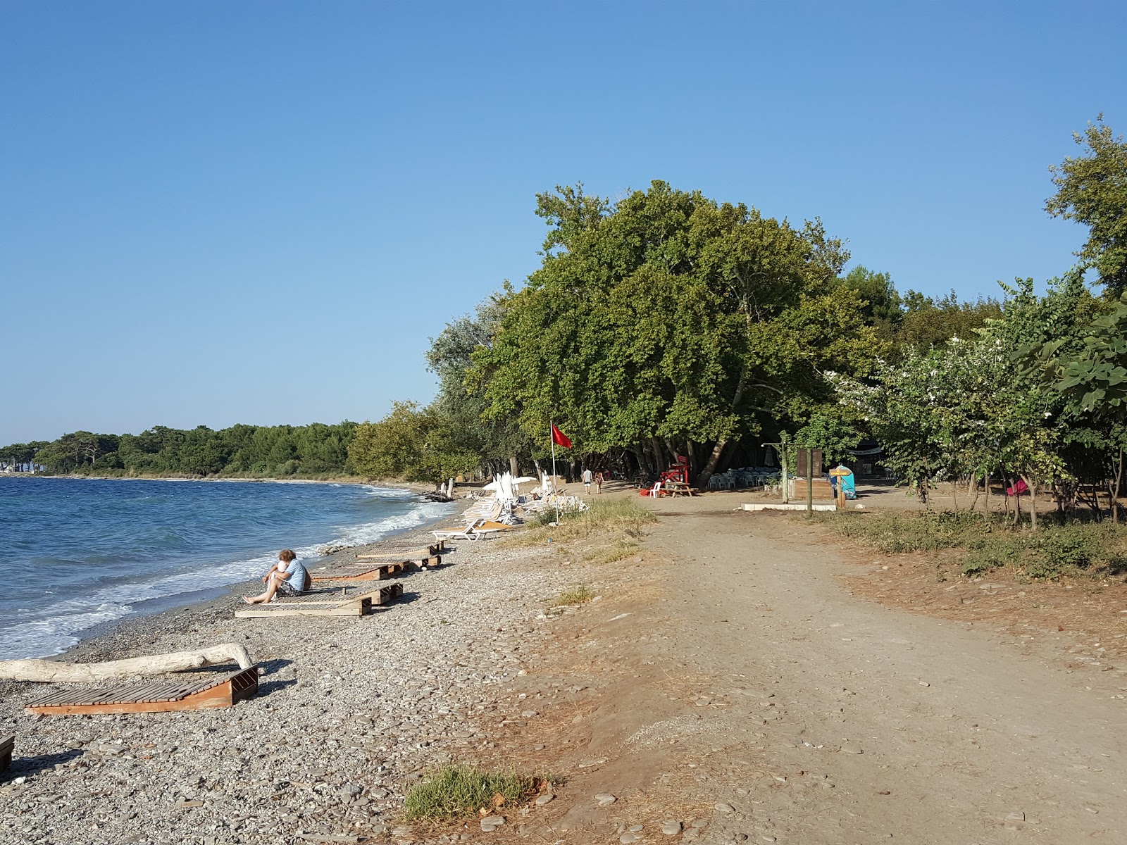 Foto van Kalamaki Plaji gelegen in een natuurlijk gebied