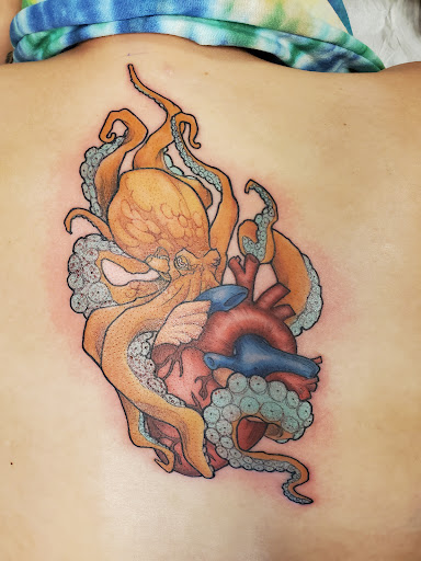 Explore small music tattoo ideas, creative tattoo ideas in Peoria, available at Guerrilla Ink Tattoos