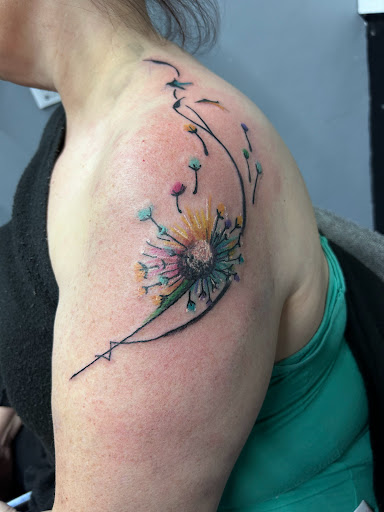 Explore silver line tattoo ideas, creative tattoo ideas in Dayton, available at Uppity Tattoos