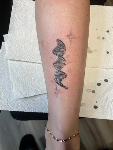 Find in between boob tattoo ideas for your next unique tattoo in Conowingo at In Bloom Tattoo