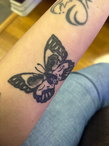 Explore first son tattoo ideas, creative tattoo ideas in Mineola, available at Kiss of Death Ink