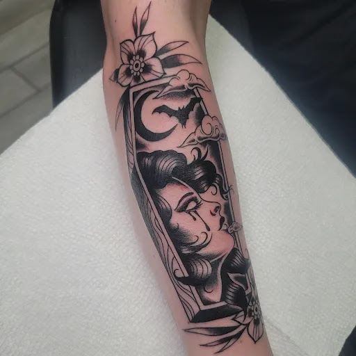 Explore thigh tattoo cover up ideas, creative tattoo ideas in Painesville, available at The Inkwell Tattoo Company